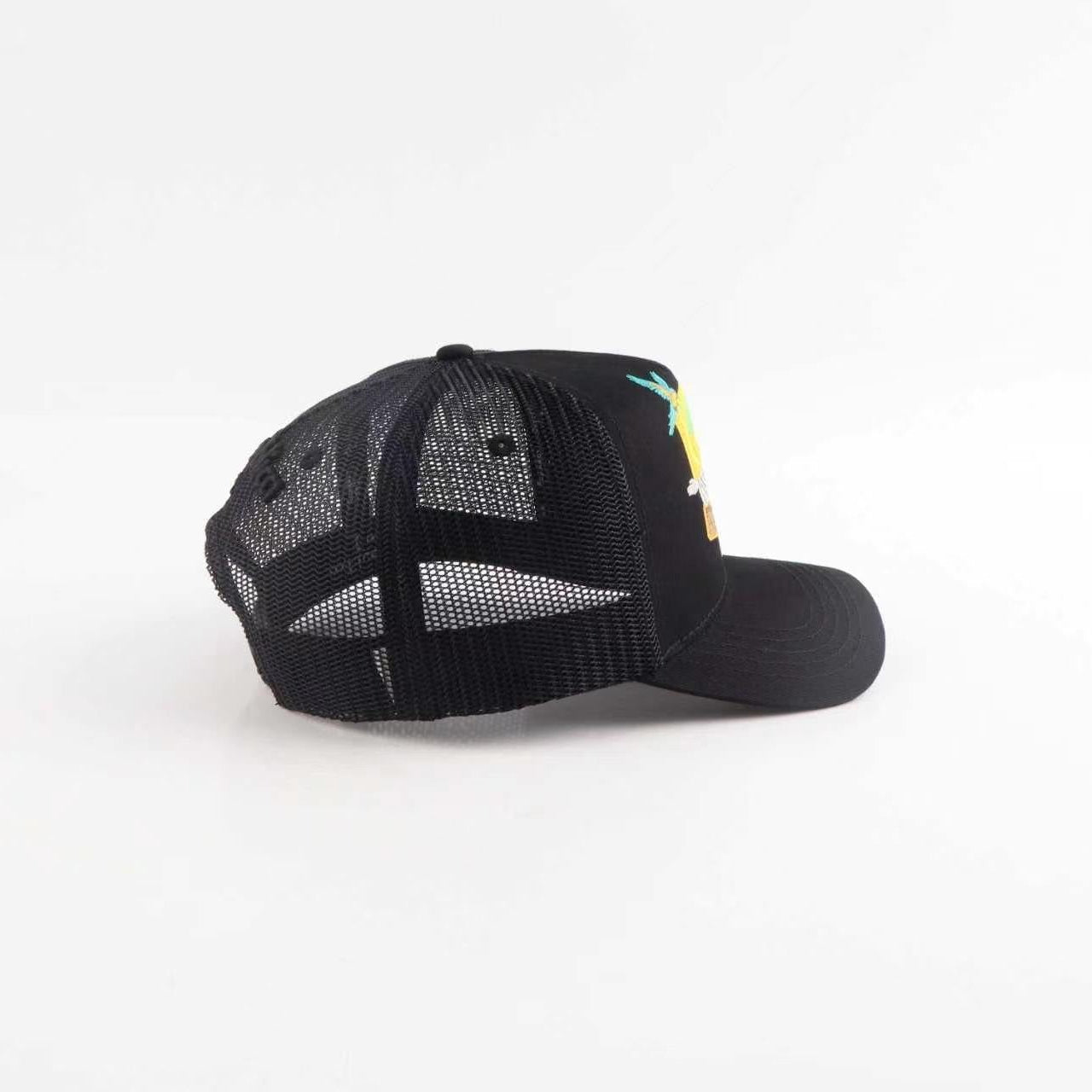Black baseball cap with colorful design on a white background