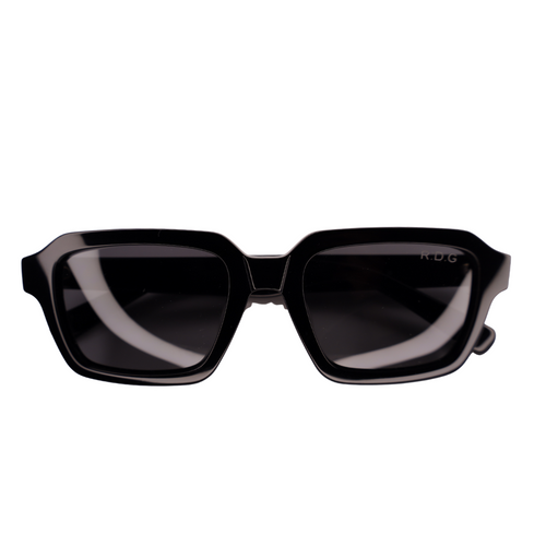 Black square sunglasses with a glossy acetate frame and dark lenses, featuring a small white 'HUG' logo on the upper right lens, shown against a plain white background.